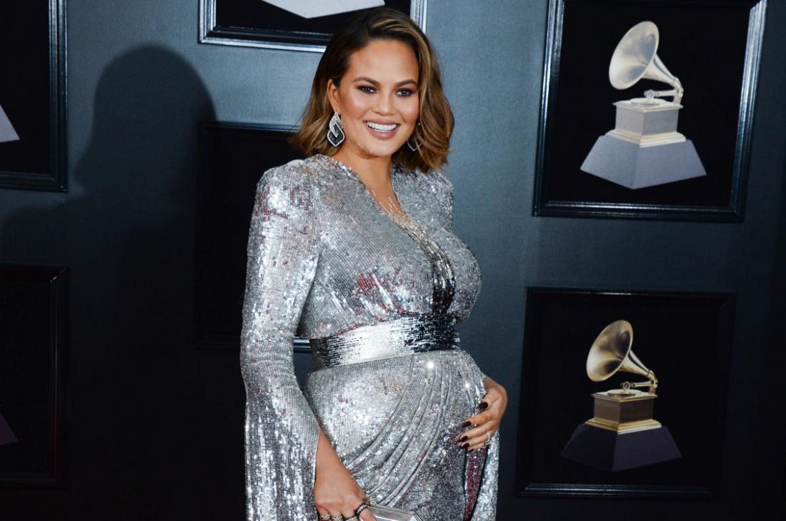 Pregnant Chrissy Teigen having a pregnancy nose