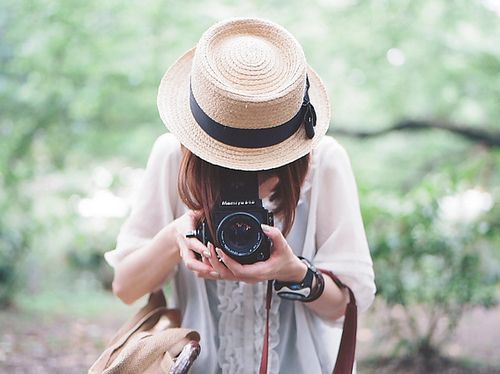 woman taking photos as part of her passion