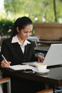 Business Woman Taking Notes