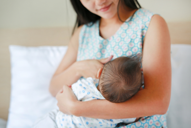 Woman Breastfeeding