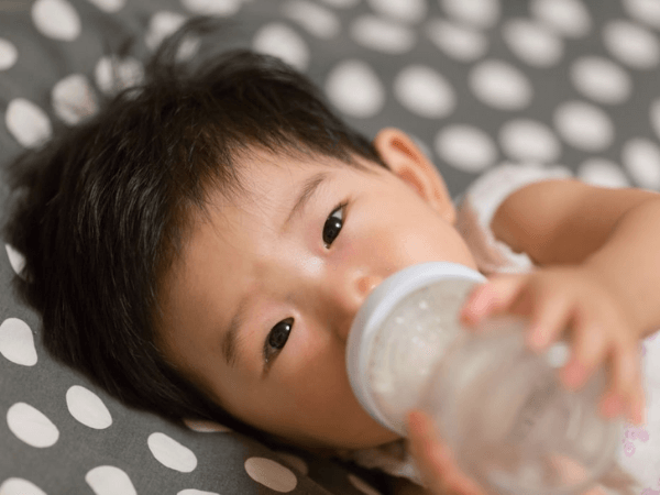 bottle-fed baby with microplastics