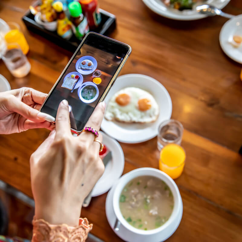 Taking photos of the food