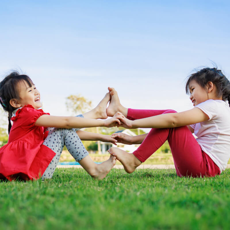 Two girls exercising for body care