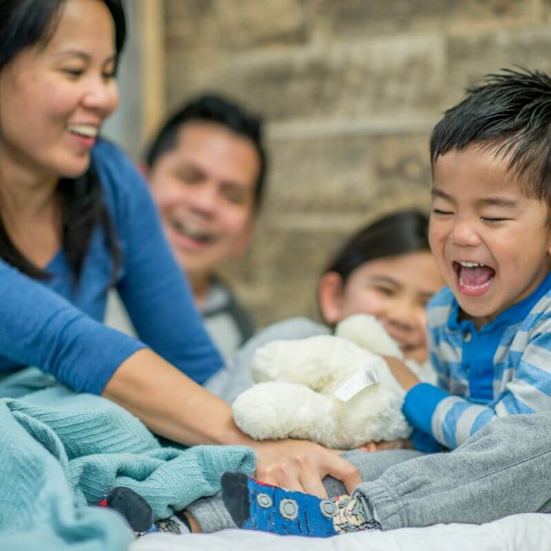 mother teaching toddler safe touch