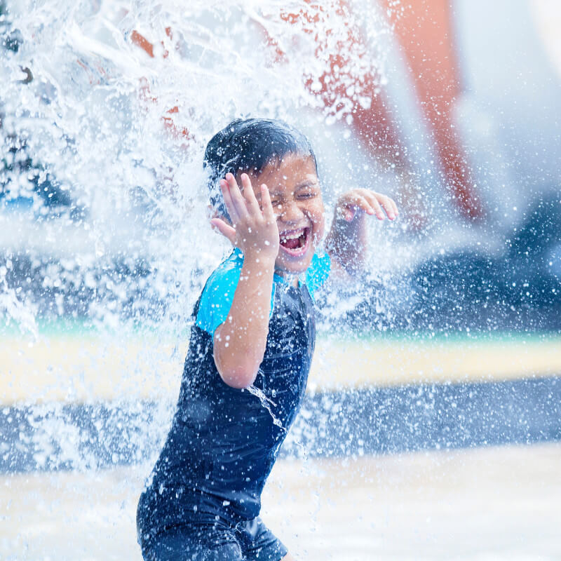 A boy at a water theme park for school holiday