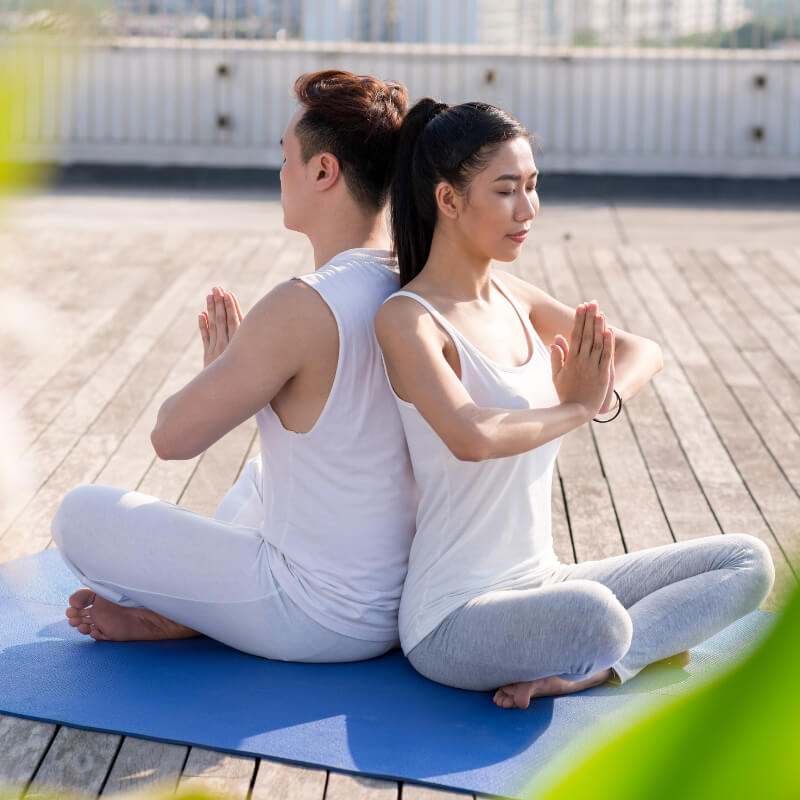 couple doing yoga