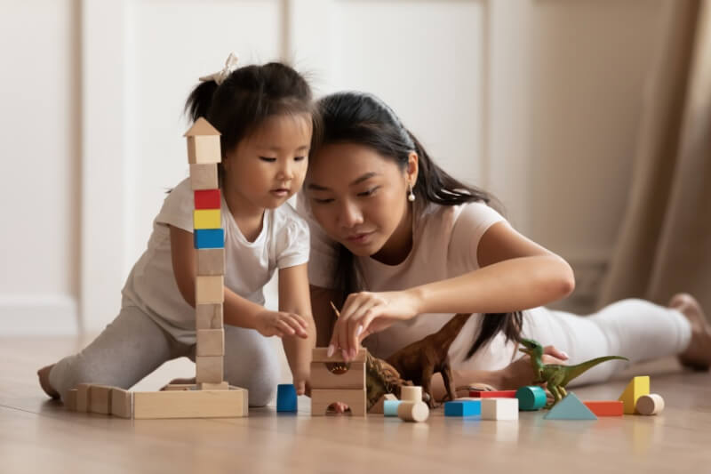 mother playing with daughter