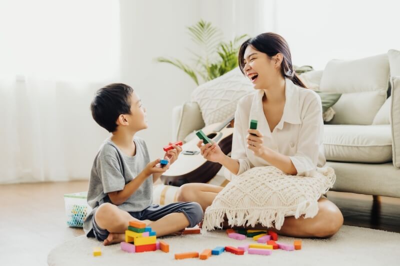 mother and son playing games